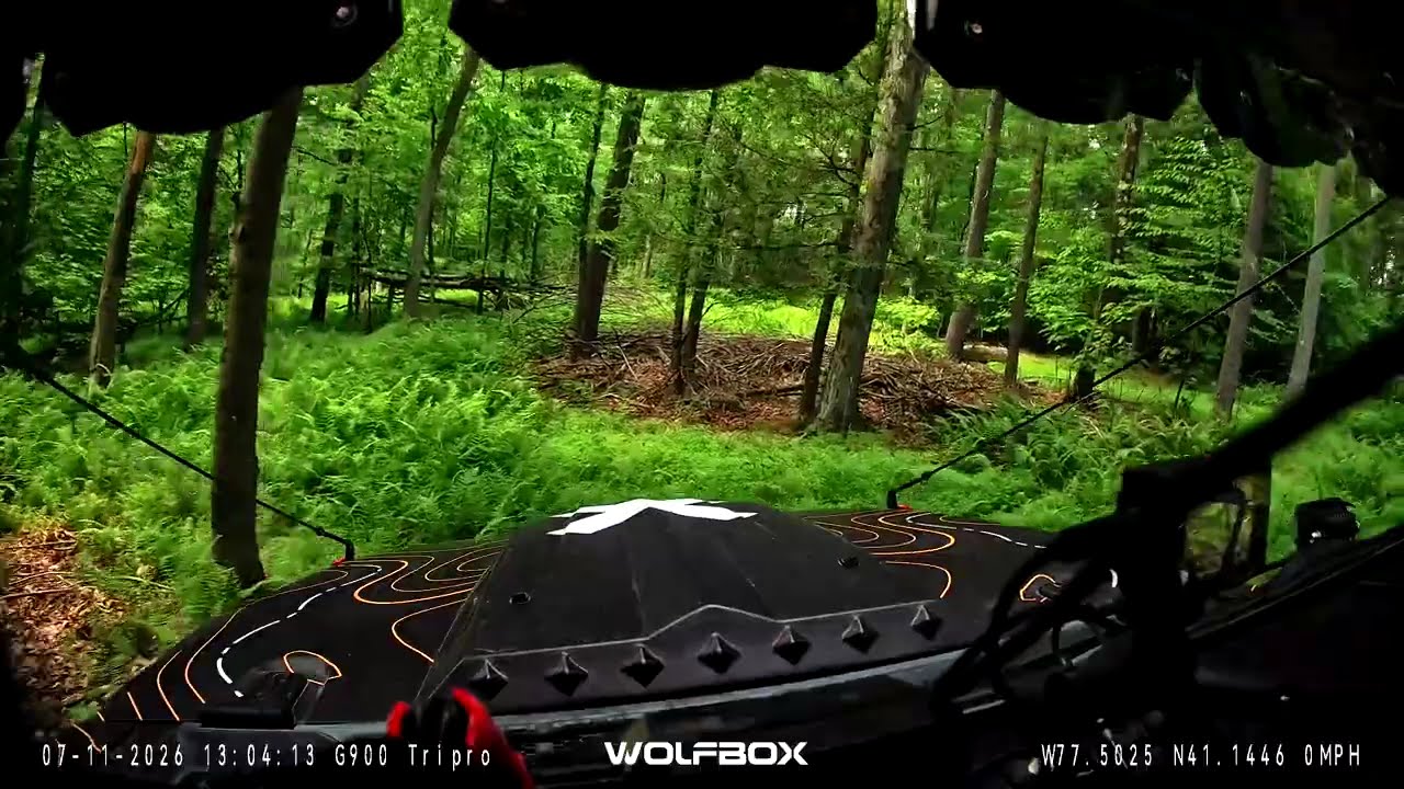 Checking trail cams on property in the Jeep Gladiator.