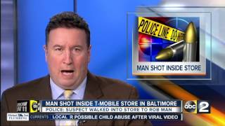 Man shot inside T-Mobile store