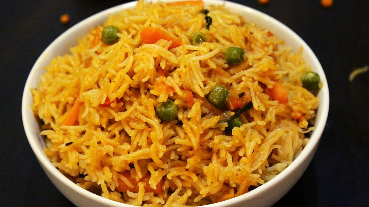 easy and delicious tomato rice biryani in cooker- lunch box special thakkali sadam/tomato pulao | Yummy Indian Kitchen