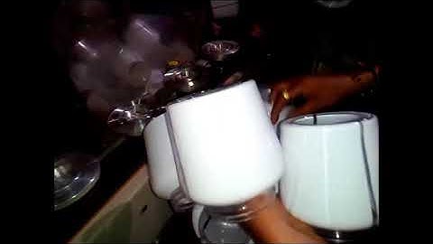 Empty Pet Ghee Jar Automatic Shrink Sleeve Labelling with Electric Tunnel and Rotating Pucks