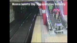 Woman rides her scooter onto an escalator and is flipped over