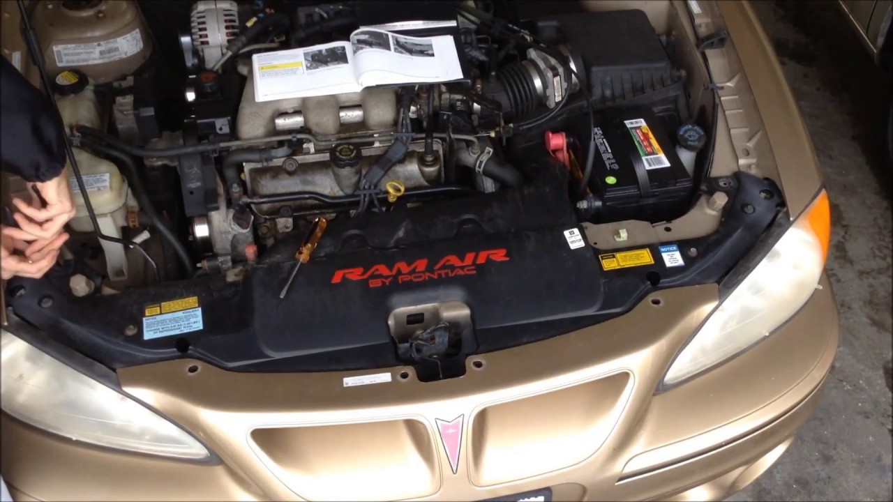 HOW TO CHANGE THE HEADLIGHTS ON A PONTIAC GRAND AM (1999 2005) YouTube