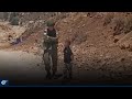 Palestinian child confronts an Israeli soldier