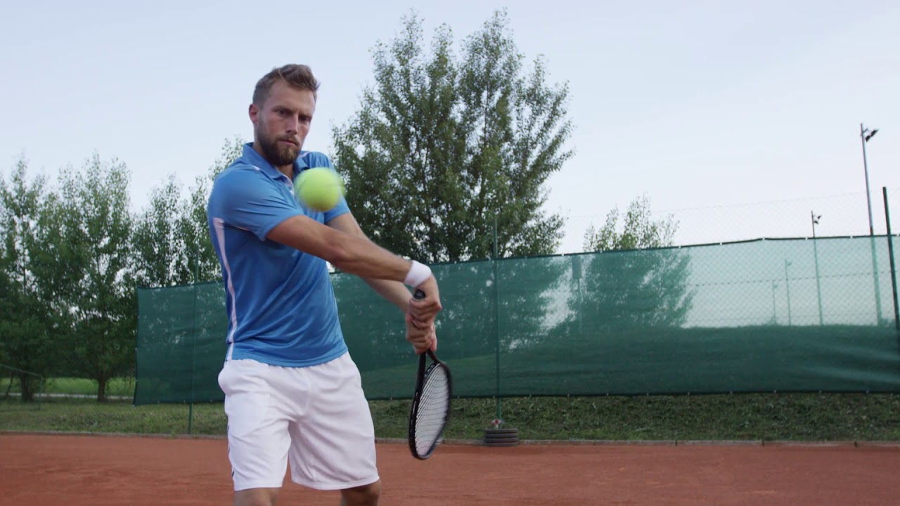 medium shot of two handed backhand YouTube