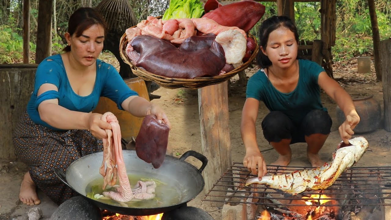 Yummy cooking intestine curry with liver and grilled fish spicy for lunch