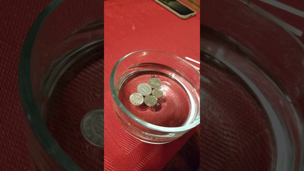How to make aluminum coins float on water surface - YouTube