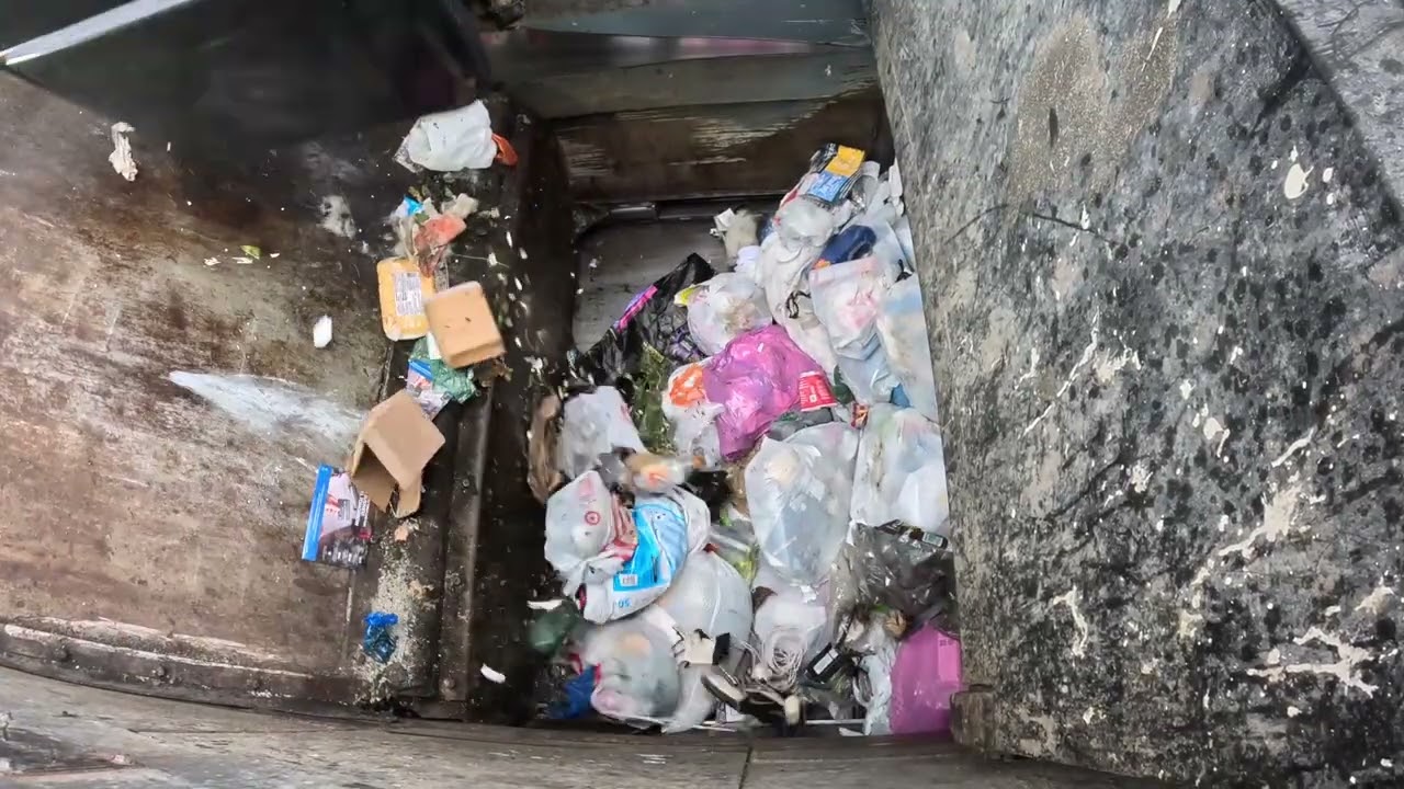 Garbage truck hopper POV: McNeilus ZR back to summer trash smashing