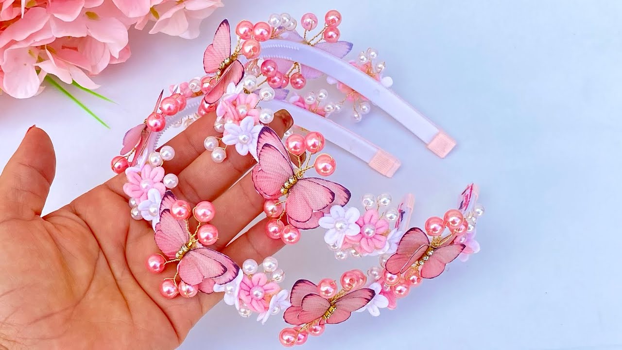 Tiara jardim encantado com florzinha 3D/ vai nos comentários