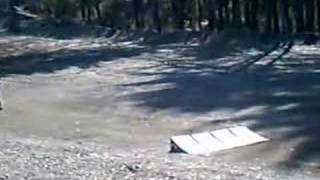 HPI Hellfire racing around and jumping