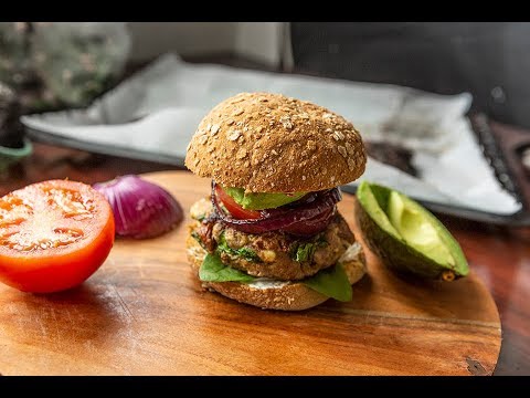 greek burger filled with feta cheese, spinach, sundried tomatoes
