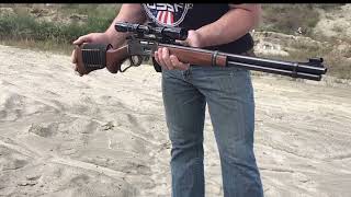 Shooting A 1976 Marlin 336 Carbine  .30-30 Shooting At Several Water Filled Jugs