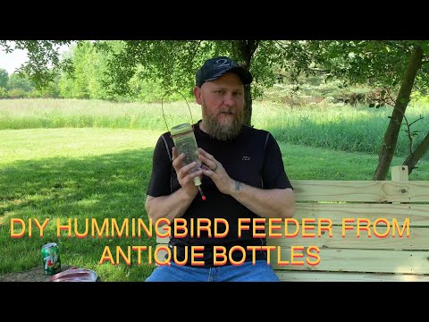 DIY Hummingbird Feeder made from antique bottles like Pepsi Coke Mountain Dew