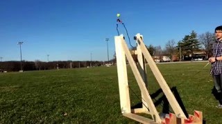 This catapult was made as a final project for a Mechanical Engineering Technology class. The catapult shot the tennis ball 203