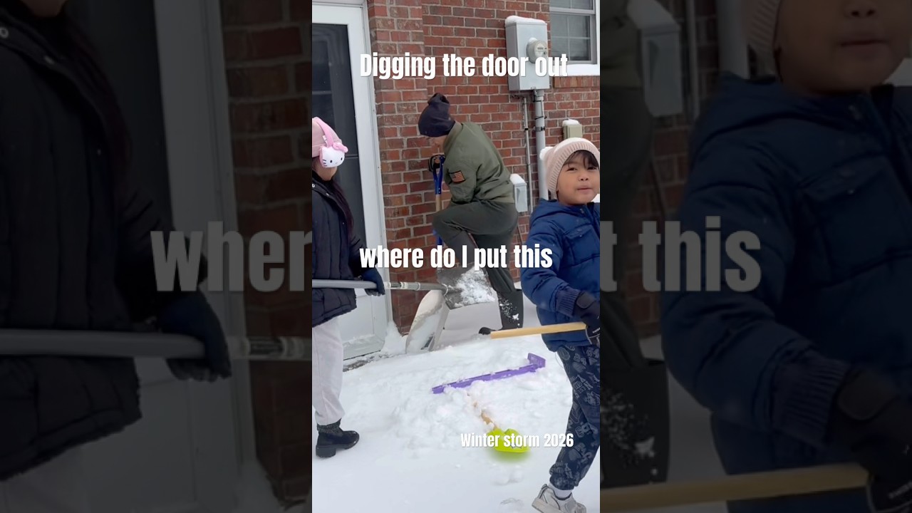 Arianna and Jordan digging the snow out from the door winter 2026 no school play time recess PE fun