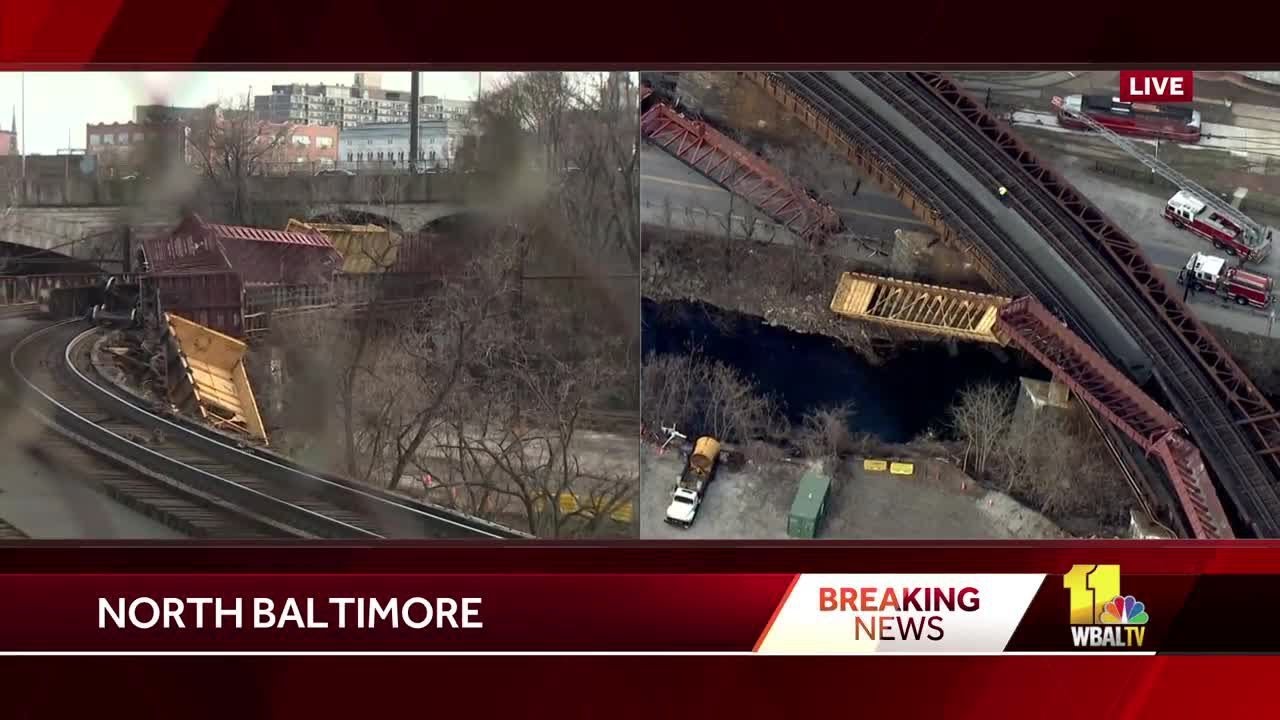 Crews investigate train derailment in Baltimore - YouTube