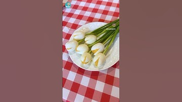 Hands down, the best #recipe for deviled #eggs ! Turn those hard boiled eggs into a tulip bouquet.