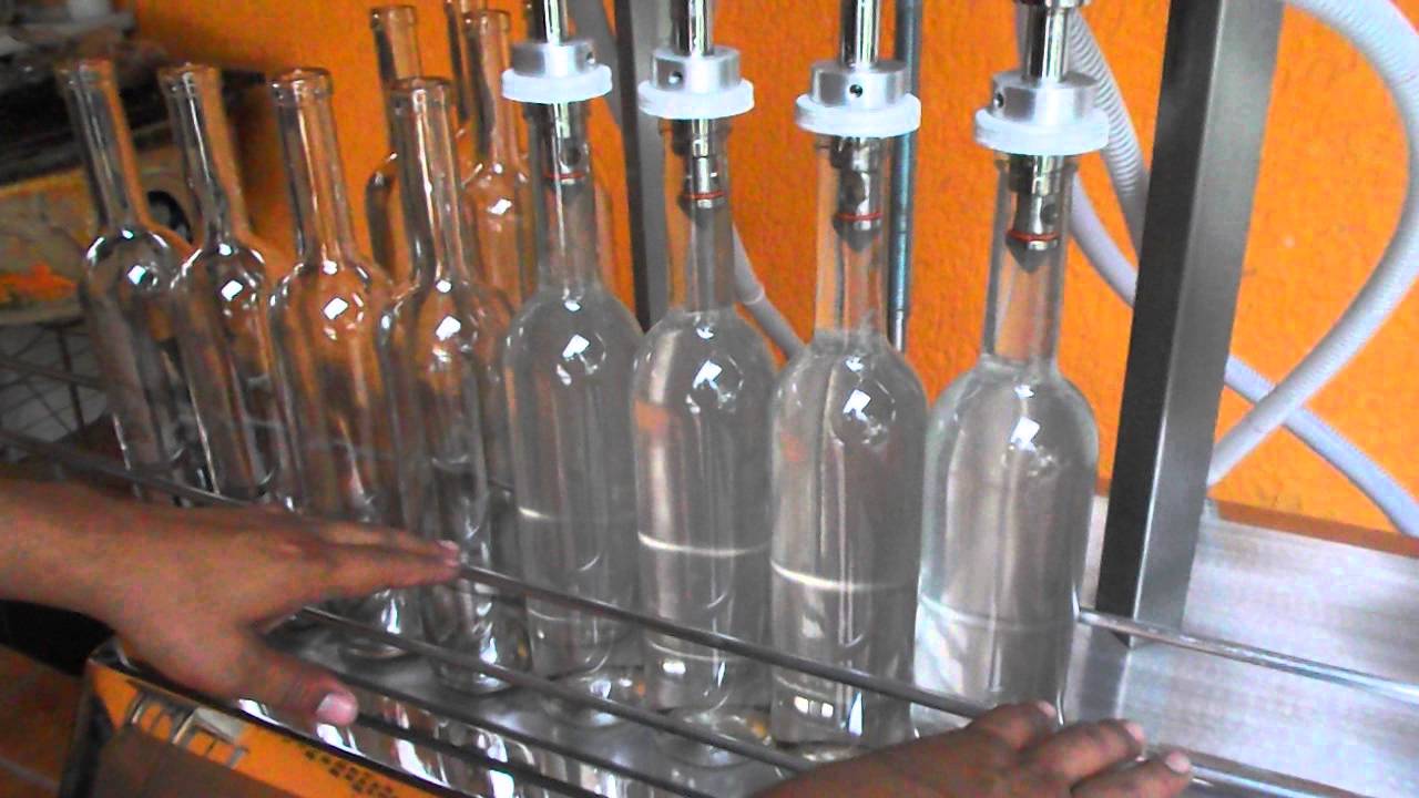 LLENADORA DE LIQUIDOS MANUAL POR PRESION.