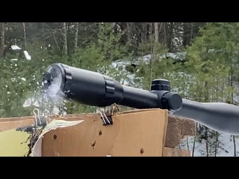 Trying to shoot the lens out of a broken CenterPoint scope with my S&W Victory 22