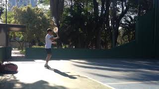 Is this a young Roger Federer training on a wall (circa 1996 maybe?)