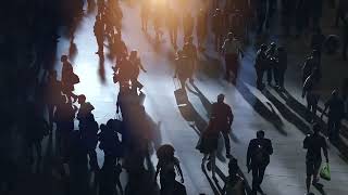 Large crowd of people walking 1171779