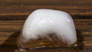 Melting ice cube timelapse
