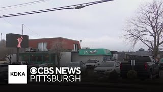 2 Pagans gang members charged in fight at bar, officials say