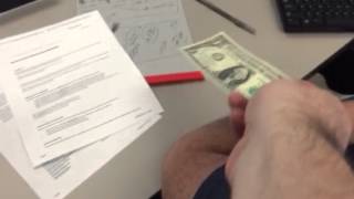 Me giving James a dollar for MegaMillions on 6-1-2015