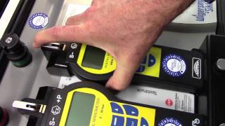 How to mount the digital manometer onto the Plexor test device