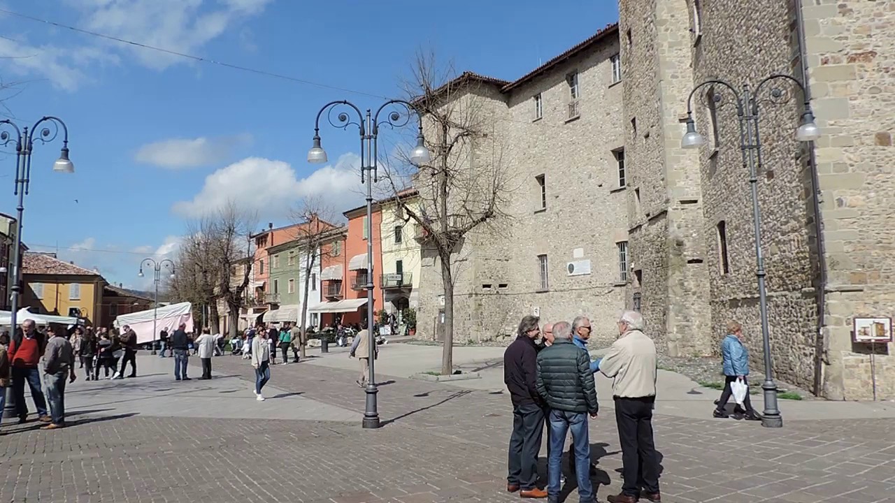 Sunday morning church bells  in the plaza