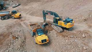 Blasting rock & and hauling it