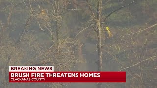 Clackamas Fire crews battle brush fire east of Oregon City; evacuation orders reduced