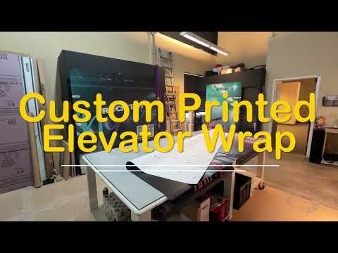 Custom printed elevator wrap for the cab interior.