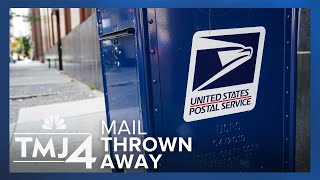 Mail carrier fired for throwing mail in dumpster