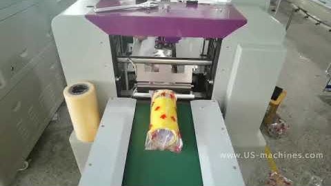 Automatic tape rolls feeding horizontal type pillow bag packing machine with tape rolls detecting fi