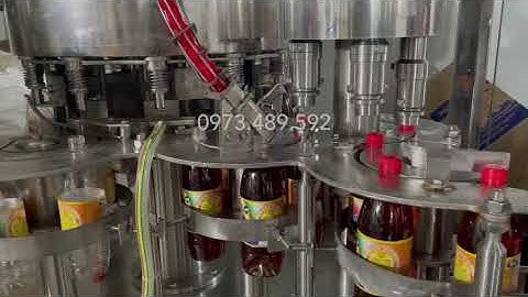 Máy đóng chai, chiết rót và đóng nắp nước mắm tự động