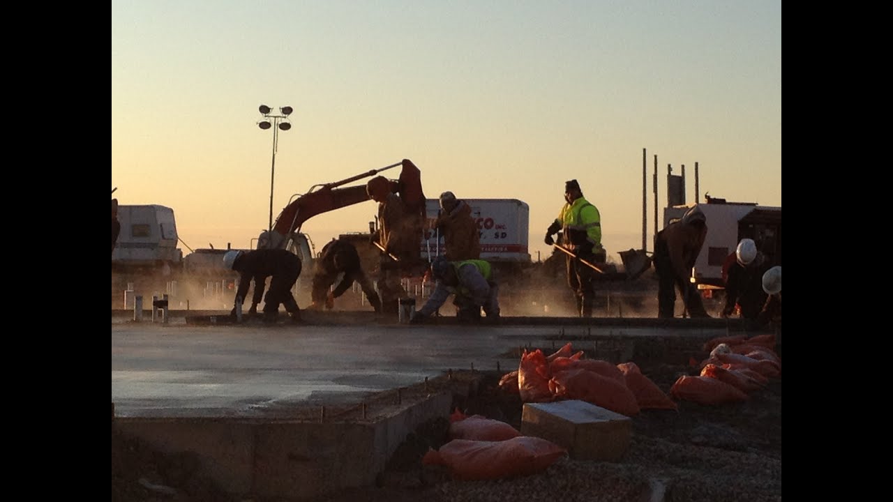 Creative Concrete pours sidewalk @ courthouse (minot):)