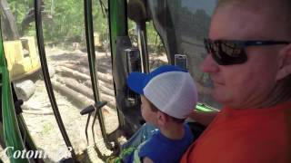 John Deere 2154d loading hardwood tops