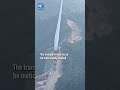 Giant wind turbine blade climbs mountain
