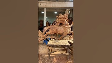 Hand-carved wood carving of East Asian dragon