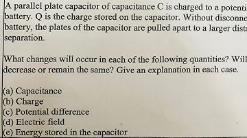A parallel plate capacitor of capacitance C is charged to a potential V by a battery disconnecting