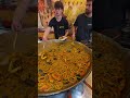 Very Big Spanish Paella. Italy Food Festival