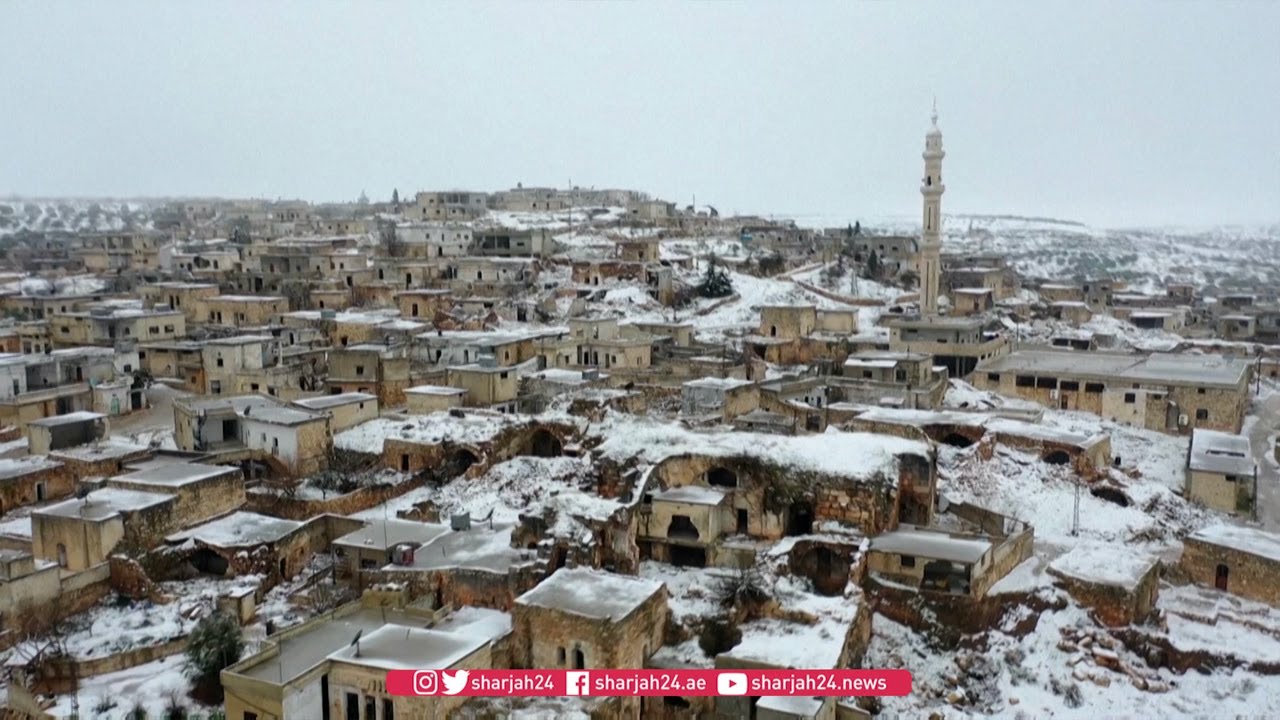 Winter storm blankets deserted frontline Idlib village with snow