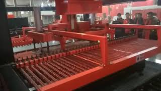 Automated sheet loading and unloading system for laser cutting machine Profile