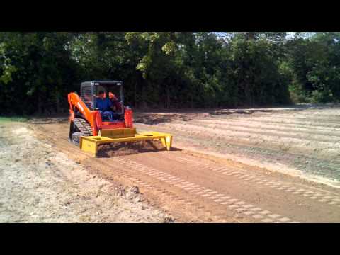 Kubota SVL75 with Cammond grader blade