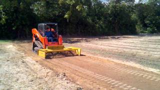 Kubota SVL75 with Cammond grader blade