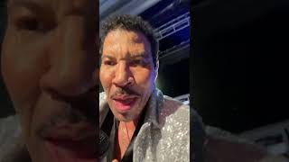 Lionel Richie Takes Cell Phone