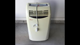 Scrapping a portable air conditioner for loads of copper, aluminum, and other metals