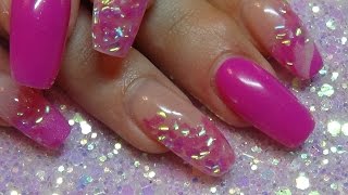 bright pink acrylic nails using fish scales