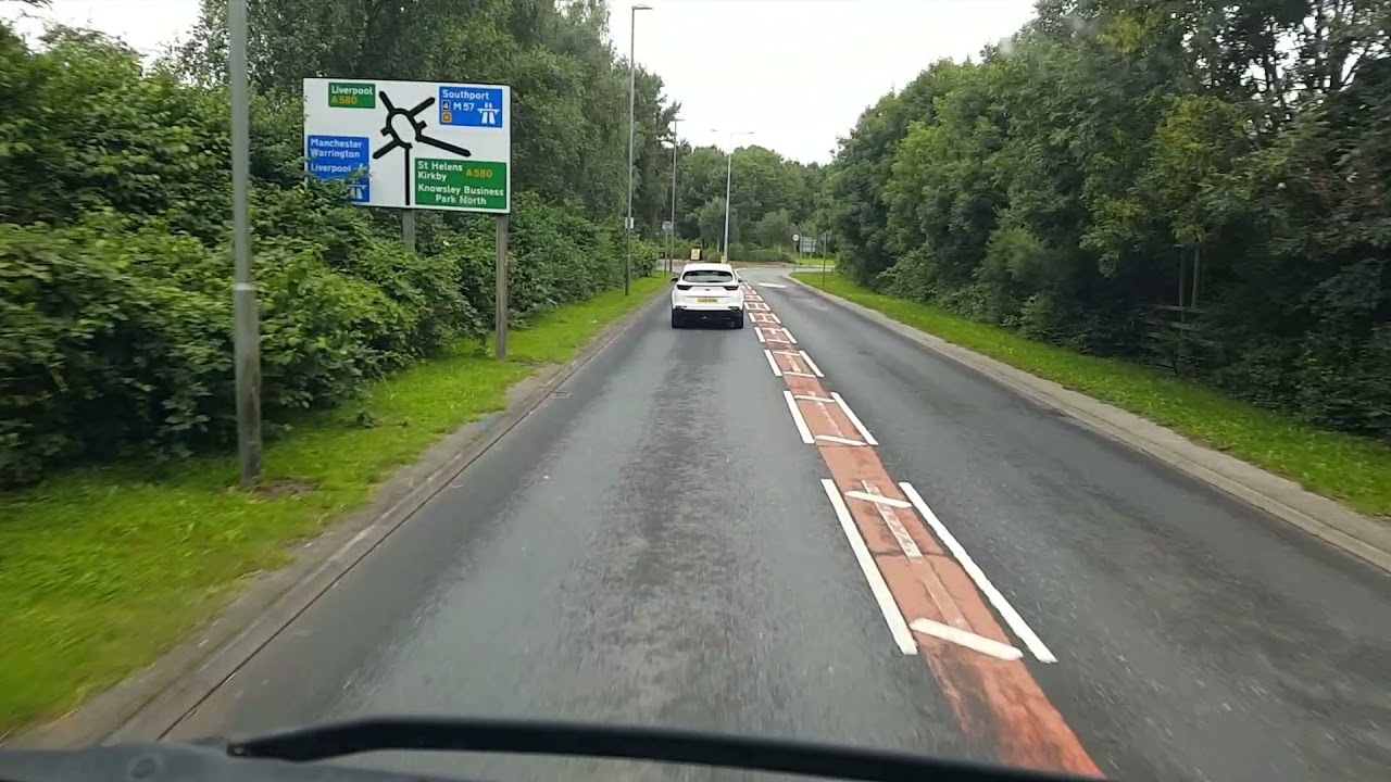 truck pulls out on truck at roundabout in Knowsley - YouTube