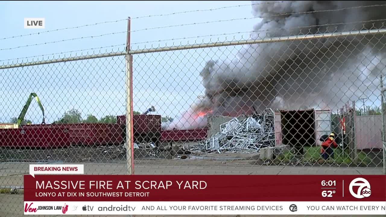 Crews battle large fire at scrap yard in SW Detroit